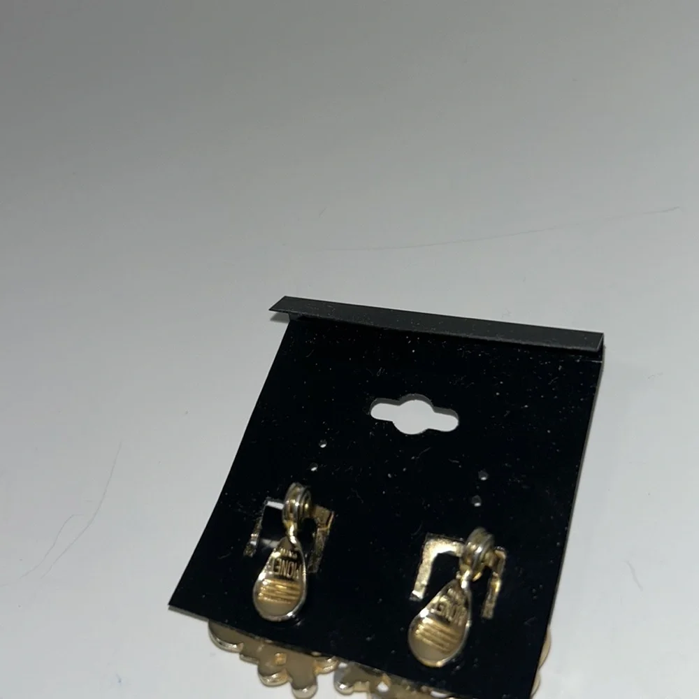 Monet gold tone shiny earrings clip filigree retro power dressing chunky barque